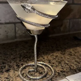 a martini glass on a counter