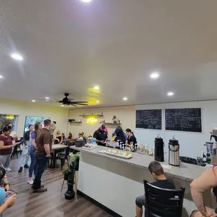 a group of people in a coffee shop