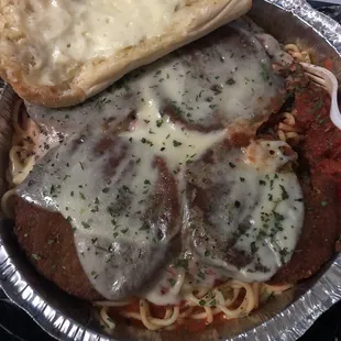 Egg Plant Parm with garlic bread. (I added the parsley on top cause I'm obsessed.)