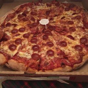 a pepperoni pizza in a box