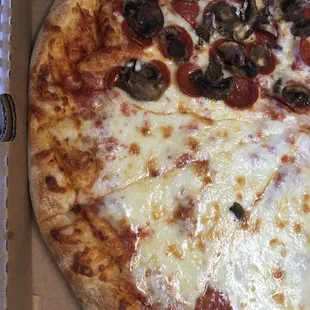 Half pepperoni and mushrooms
