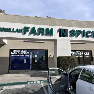 a car parked in front of the store