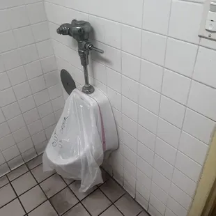 a urinal in a bathroom