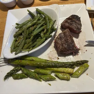 8 oz filet med rare and with green beans and asparagus. Delicious and leftovers for breakfast tomorrow.