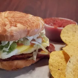 Bacon Egg &amp; Cheese Croissant! Our B.L.T. sandwich combined with fried egg!
