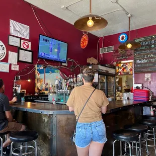 people sitting at the bar