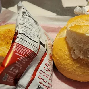 Half ham and cheese sandwich and bread bowl soup