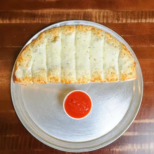 Our renowned Buffalo-style pizza, pasta, subs, salads, and wings are made with family heirloom recipes, perfected over generations.