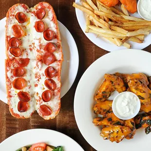 Our renowned Buffalo-style pizza, pasta, subs, salads, and wings are made with family heirloom recipes, perfected over generations.