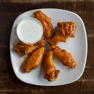 Our renowned Buffalo-style pizza, pasta, subs, salads, and wings are made with family heirloom recipes, perfected over generations.