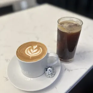 a cup of coffee and a glass of coffee