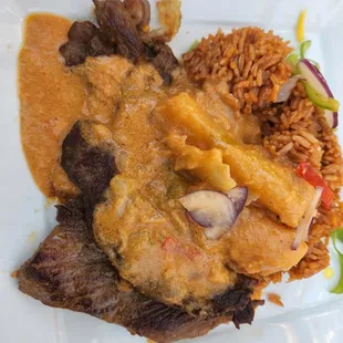 Mafe with lamb and jollof rice.