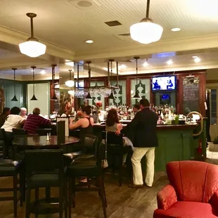 people sitting at the bar