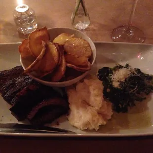 Flank steak with creamed spinach , two kinds of potatoes