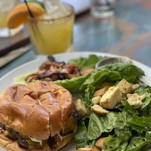 a plate with a sandwich and salad