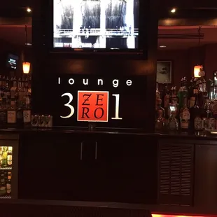 a bar with a large screen television