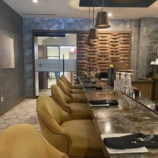 a long table with chairs in a restaurant