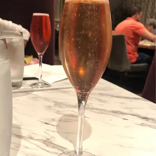 Watermelon mimosa (foreground), cranberry mimosa (poinsettia) (background)