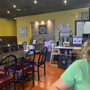 Plenty of indoor seating with chairs and booth's available