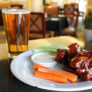 Classic pair of an ice cold beer and wings