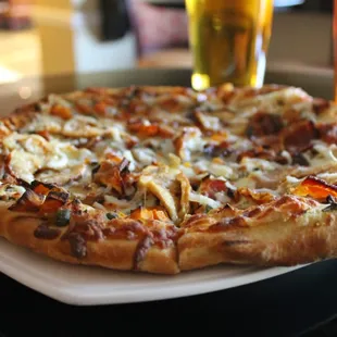 Try our fan favorite Brie pizza topped with butternut squash, red apples, crisp bacon and smooth brie