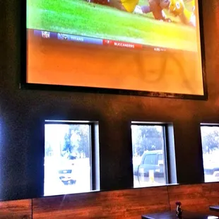 a football game on a big screen