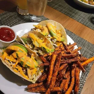 Shrimp tacos BUT WAIT ... Substituted with baked walleye  - absolutely heavenly along with the crispiest sweet potato tacos