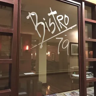 a sign in a window of a restaurant