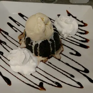 a desert with ice cream and chocolate sauce