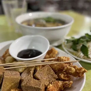 hair on food in the bottom left. Didn&apos;t notice till I was about to eat it.   #15. Combo - Fish balls were delicious!