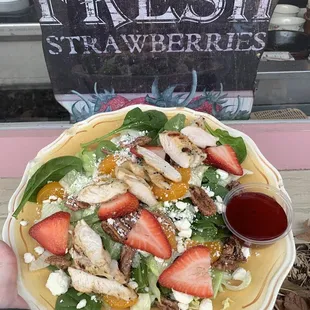 Strawberry, chicken, pecan salad in a light vinaigrette dressing