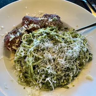 Spaghetti with Pesto and meatballs, fresh parmiggiano on top