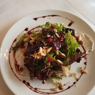 a plate of salad on a table