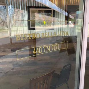 a chair in front of a window