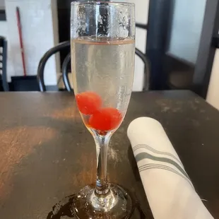My French 75 (wth is it with a stupid maraschino cherry)