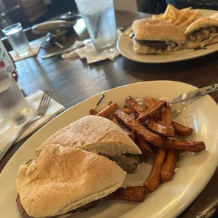 Steak sandwich with sweet potato fries. (Picture doesn&apos;t do it justice but it was one of the best sandwiches I&apos;ve had)