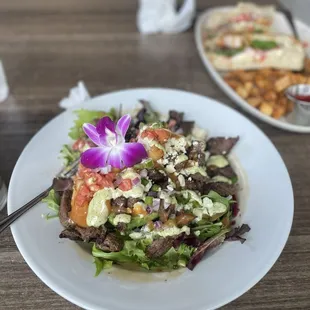 Avocado relleno with steak and shrimp