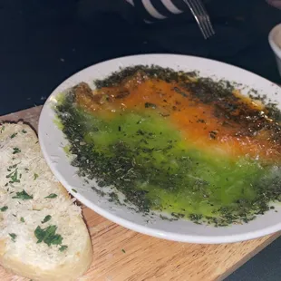 Their version of an olive oil dip for bread (grated cheese and herbs and olive oil)