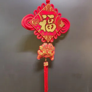 a red and gold decoration