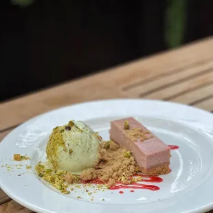 a plate of food on a wooden table