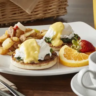 a plate of food and a cup of coffee