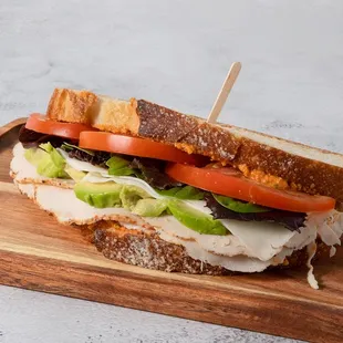 a sandwich on a cutting board