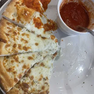 Cheese bread sticks. Pretty much a cheese pizza without sauce. It was good!