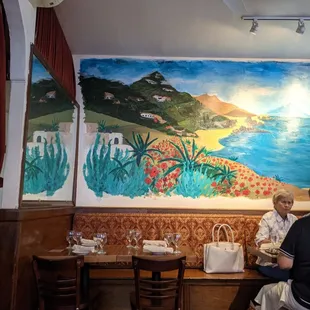 Very beautiful, long painting along their wall.