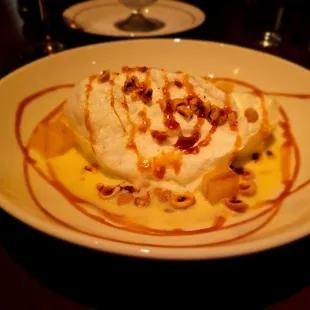 ile flotation (duck egg white meringue, orange &amp; cardamom creme anglaise, pineapples, candied hazelnuts &amp; salted caramel)