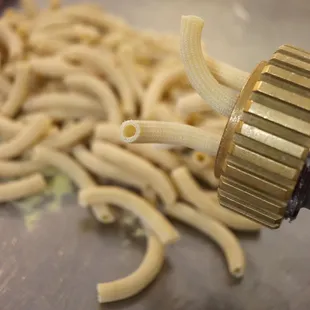 a close up of pasta being cooked