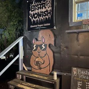 a picture of a squirrel with sunglasses