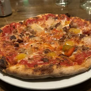 Personal 10" pizza - Sausage &amp; Peppers. Good, not great.  Earned 4 stars.  Needs a better crust