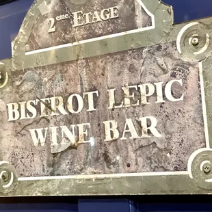 Sign for upstairs wine bar