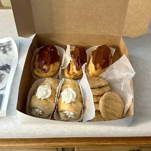 Beautiful eclairs with a side of peanut butter cookies!